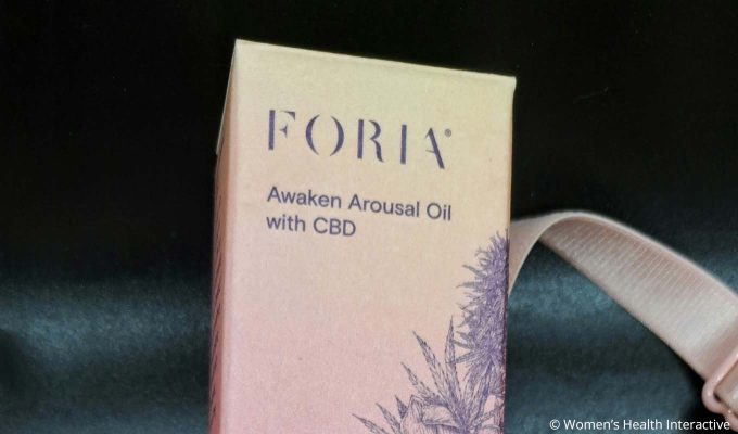 foria awaken arousal oil with cbd box next to bra strap