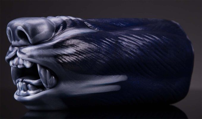 photograph of a canine orifice fleshlight design featuring deep, inky black coloring on the muzzle, teeth, and nose