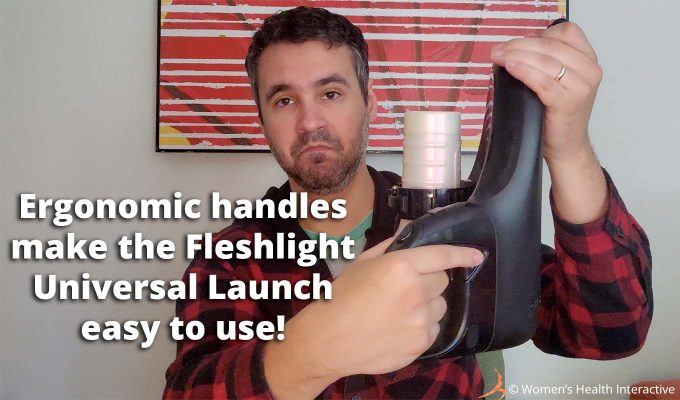 photograph of product tester justin holding one handle of the fleshlight universal launch to display how it fits his hand with text overlay that reads: ergonomic handles make the fleshlight universal launch easy to use