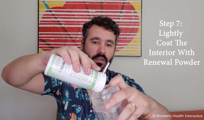 photograph of justin applying fleshlight renewal powder inside a clear fleshlight to demonstrate its application more clearly with text overlay that reads: step 7 lightly coat the interior with renewal powder