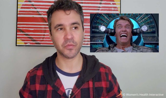 photograph of product tester justin casting side eye toward an image of a character in total recall making a pained face, conveying how the design of the fleshlight turbo core reminds him of the drilling vehicles from total recall and how it wasn't somewhere he really wanted to stick his dick