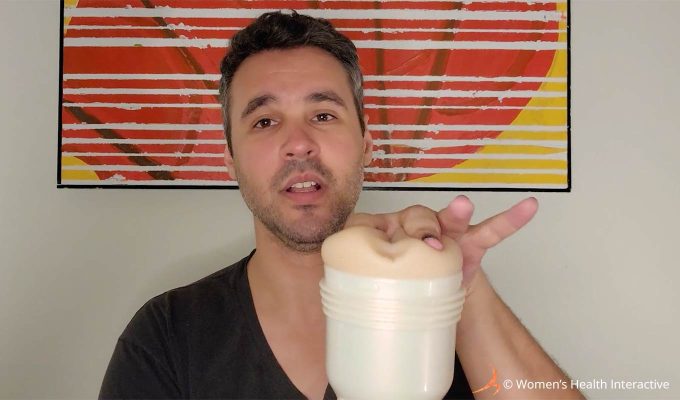 photograph of justin pressing his fingers around the orifice of the mia malkova boss level anal pornstar fleshlight