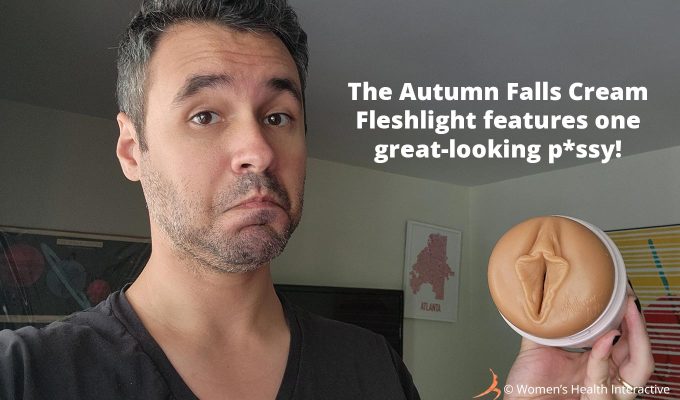 photograph of tester justin holding the autumn falls fleshlight in his hand with text overlay that reads: the autumn falls cream fleshlight features one great-looking p*ssy