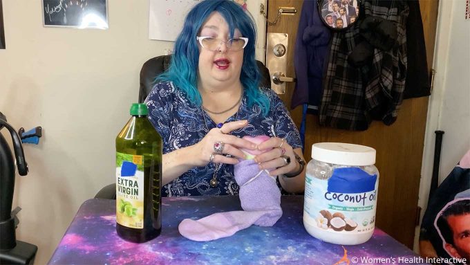 photograph of wednesday applying lube to a sock fleshlight she made