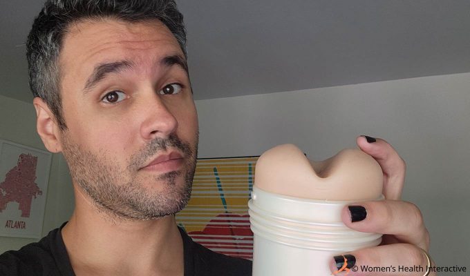 photograph of tester justin holding the mia malkova boss level fleshlight girl to display the extra cushioning around the orifice