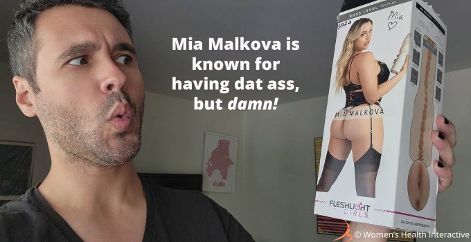 photograph of tester justin whistling while looking at the box for the mia malkova boss level pornstar fleshlight with text overlay that reads: mia malkova is known for having dat ass but damn