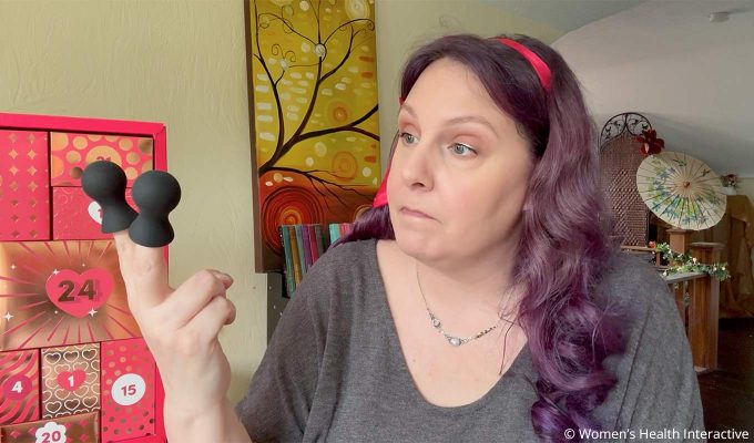 product tester alison looking at nipple suckers from the 2026 lovehoney advent calendar for couples