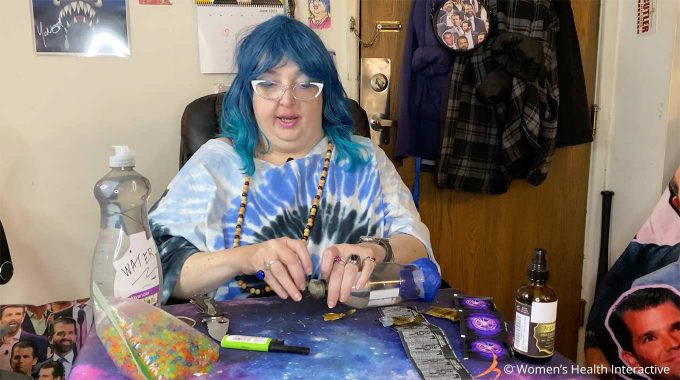 photograph of wednesday putting the lid back on the bottle of her diy condom fleshlight