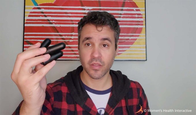 photograph of product tester justin holding the three bullet vibrators that came with the fleshlight vibro butt in one hand