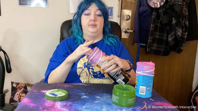 photograph of wednesday applying lube to her pringles can fleshlight