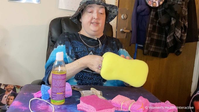 photograph of wednesday inserting her fingers into a sponge pocket pussy she made