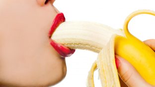 Woman Seductively Eating A Banana