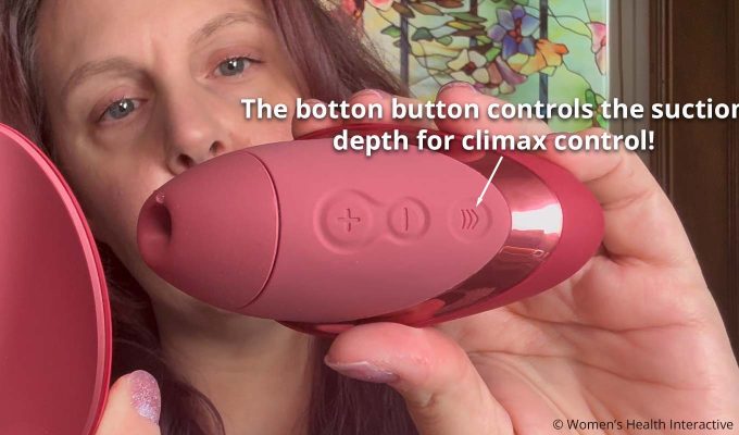 closeup detail of the suction depth control button on the womanizer next liberty